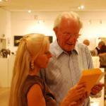 David Shephard listens with interest as Calley shares with him  about The Rama Exhibition.